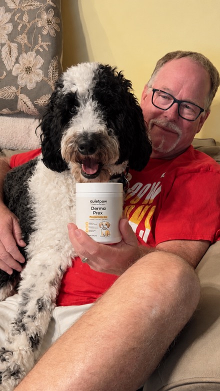 Dog enjoying QuietPaw chew